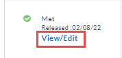 The status panel showing that a requirement was met and offering a link to view or edit the submitted item.