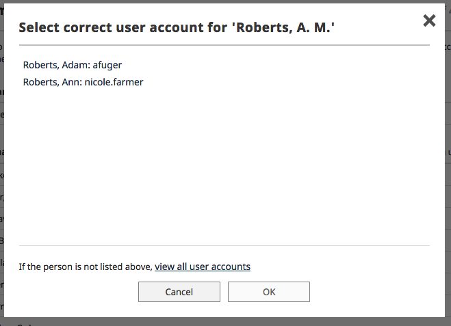 The Select correct user account for Roberts, A. M. modal showing two account options with usernames, a link to view all user accounts, and the buttons Cancel and OK at the bottom.