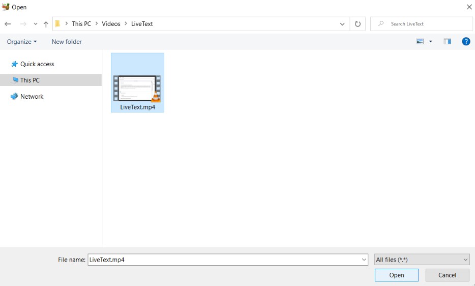 The file browser window showing a LiveText.mp4 video file selected in the LiveText folder with the file name displayed in the File name field and the Open and Cancel buttons at the bottom.