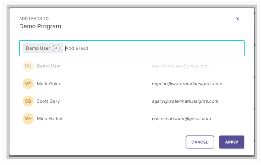 The Add Leads modal for Demo Program showing a lead selection field with an existing lead chip and an input for adding more leads, followed by a list of users with names and emails, with the buttons Cancel and Apply at the bottom.